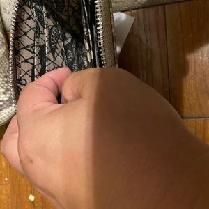 Carlos Santana crossbody with matching walket